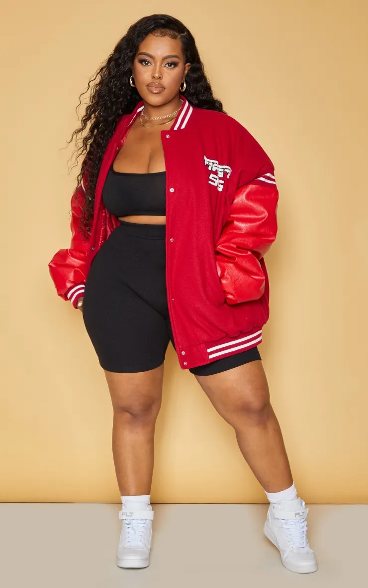 Plus Veste teddy style bomber oversize rouge à manches